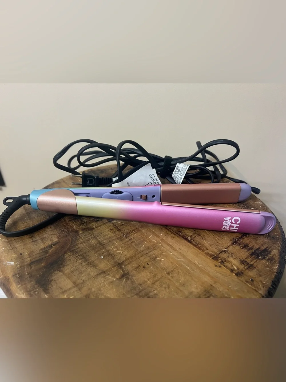 CHI Vibes On the Edge Hairstyling Iron with curved ceramic plates and a past